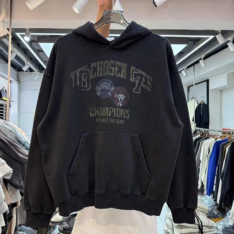 A woolen hoodie is loose