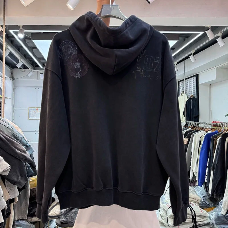 A woolen hoodie is loose