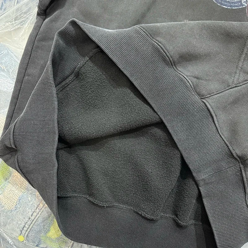 A woolen hoodie is loose